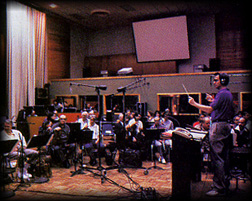 David Friedman conducts the orchestra at recording sessions of 'Beauty and the Beast'